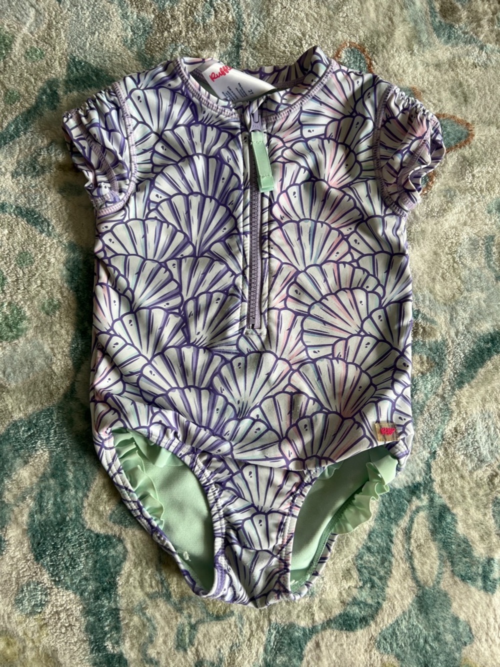 RuffleButts Purple Shell-Print Toddler Rashguard Bathing suit